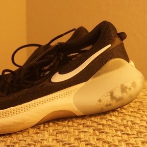 Nike black sneakers with stylish foam details in blue. Women’s Size 7.